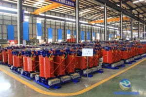 Finished dry-type transformers ready for shipment in factory storage area