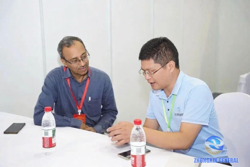 Export manager Zhou and Deputy GM Xia Fawan inviting an Indian client to visit the factory and project sites