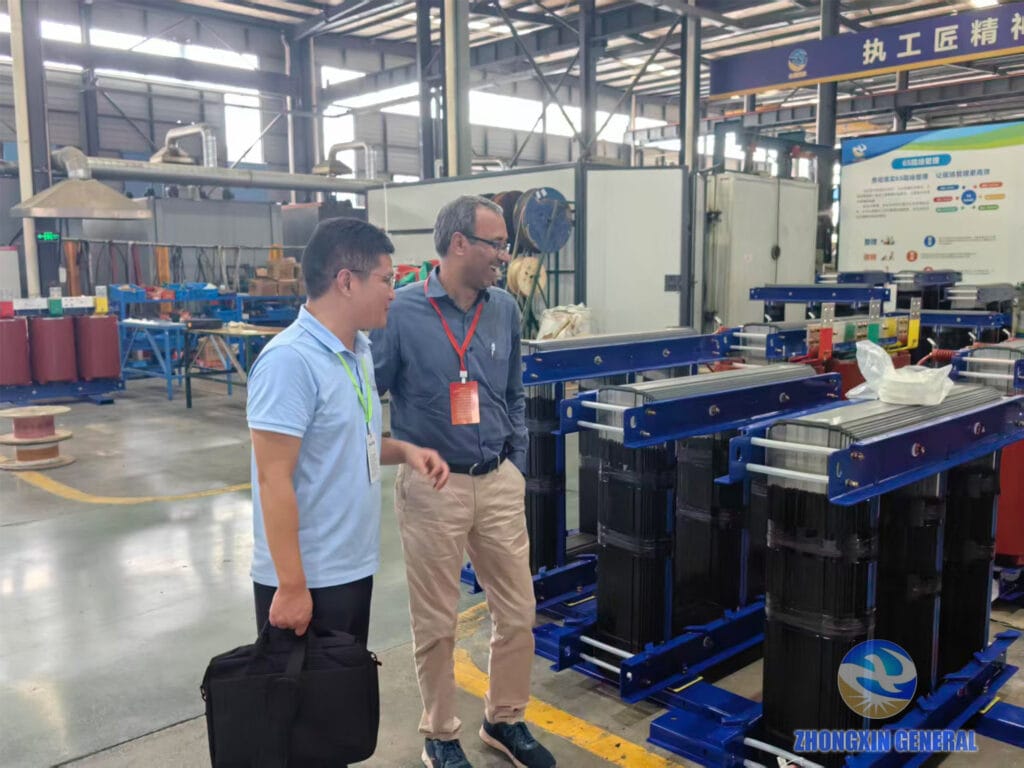Export manager Zhou leading an Indian client on a tour of the Zhongxin General factory