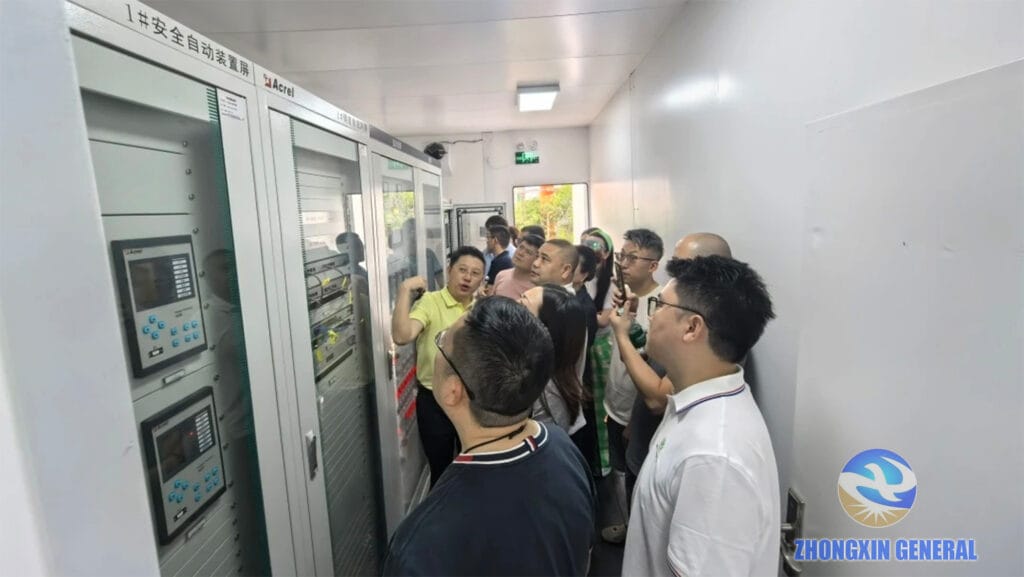 Zhongxin General Chairwoman Li Xia explaining the cabin's internal cabinet layout to visitors