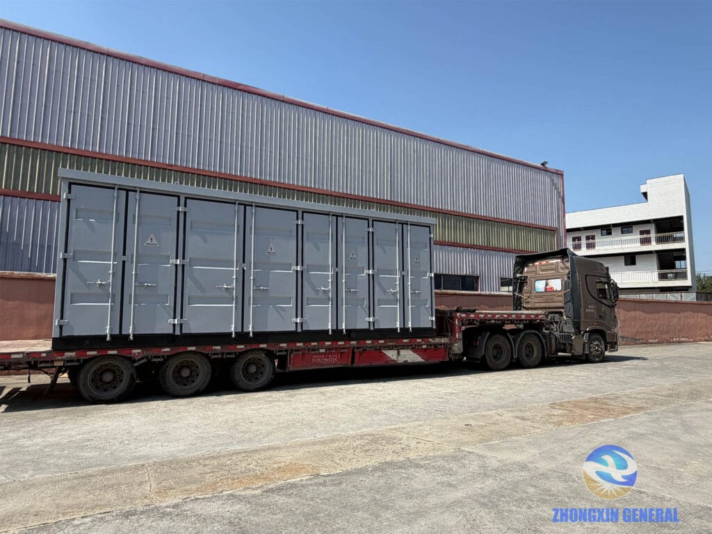 Prefabricated cabin loaded on truck bed for shipment