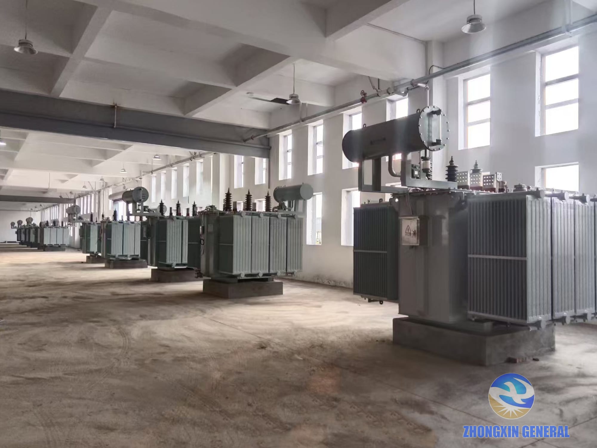 Row of installed S11-6300/36.5 oil-immersed transformers at Xinjiang data center site — Zhongxin General