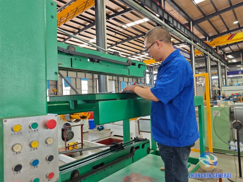 Technician recording silicon steel cutting measurement data on inspection sheet