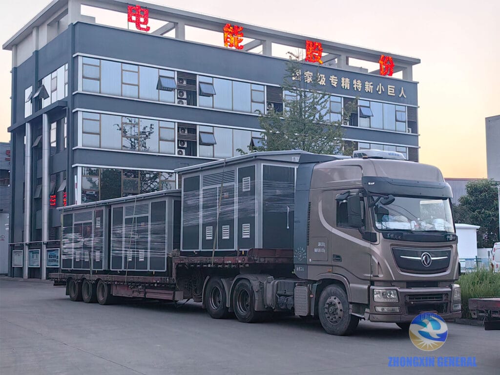 Three box-type substations loaded and secured on truck