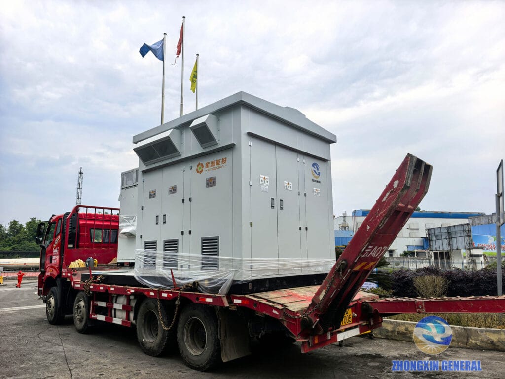 Step-up transformer cabin and inverters being transported to the Weiyuan energy storage site