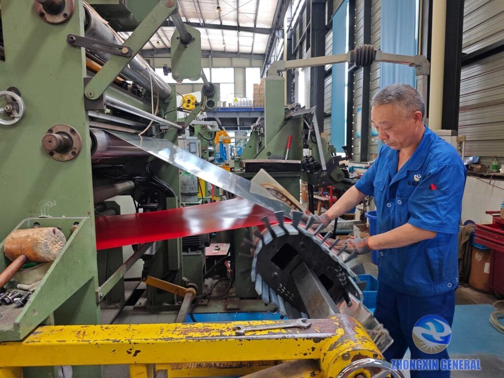 Operator operates professional foil winding machine to produce transformer coils with even wire tension