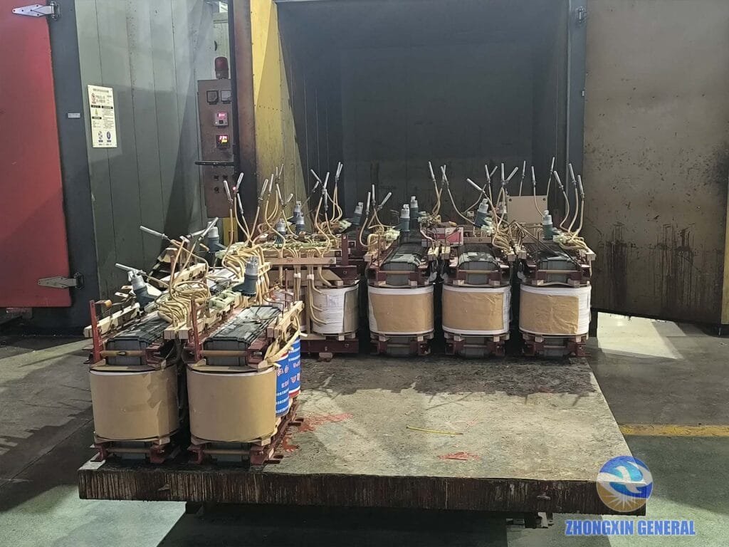 Transformer active part entering oven for dehumidification and baking