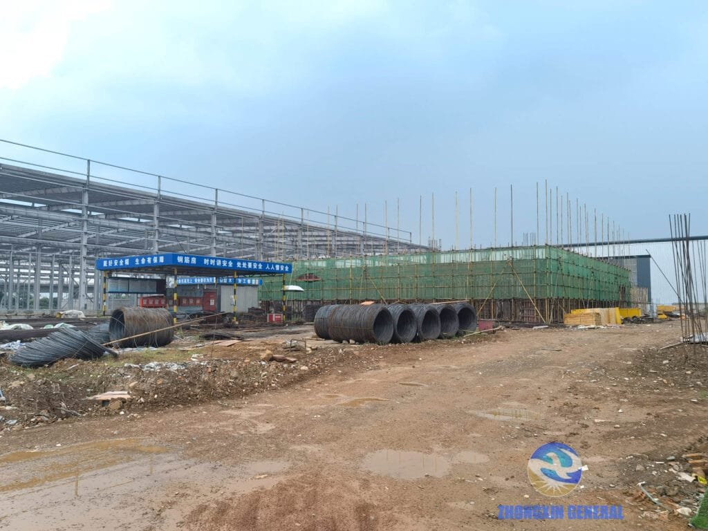 Left-side workshop building and main office building progress at Boruian New Energy storage base construction site, July 10 2026