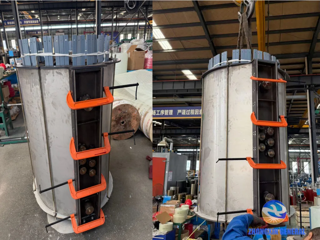 Workers securing the high-voltage winding mold before resin casting