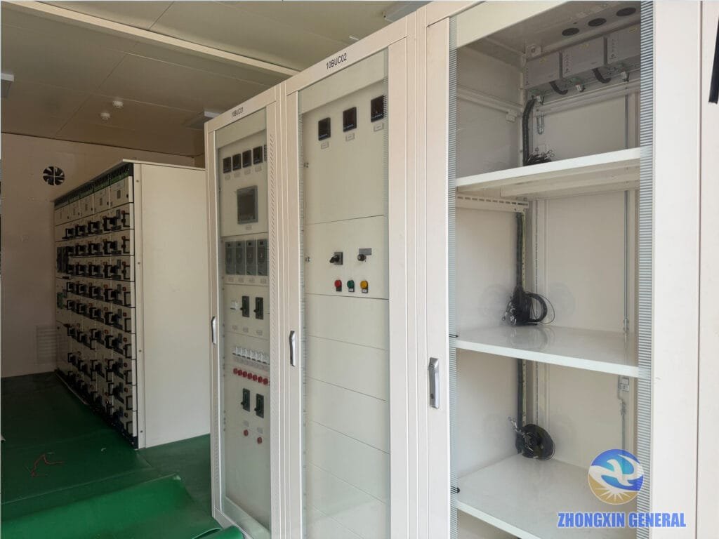 Full interior view of switchgear panels arranged inside the prefabricated cabin