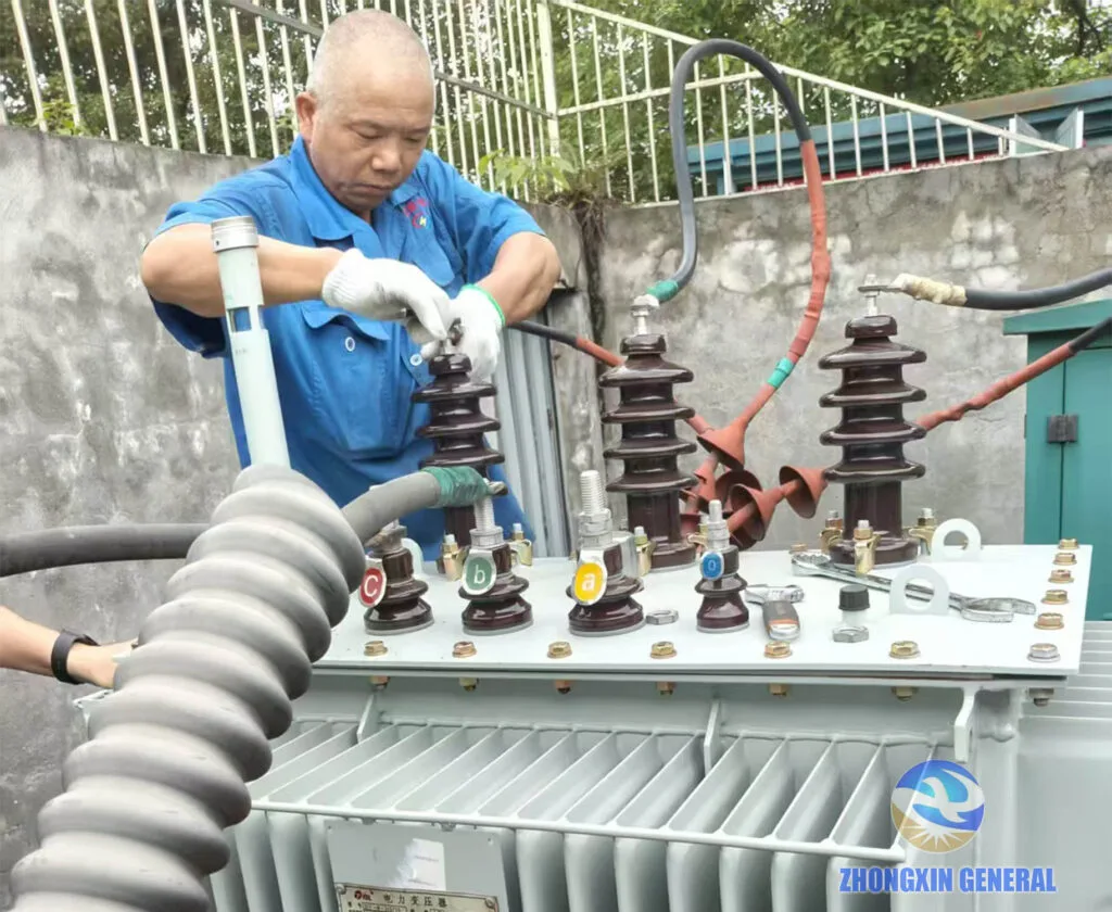 maintenance worker inspecting and repairing connection bushing of outdoor oil‑immersed transformer