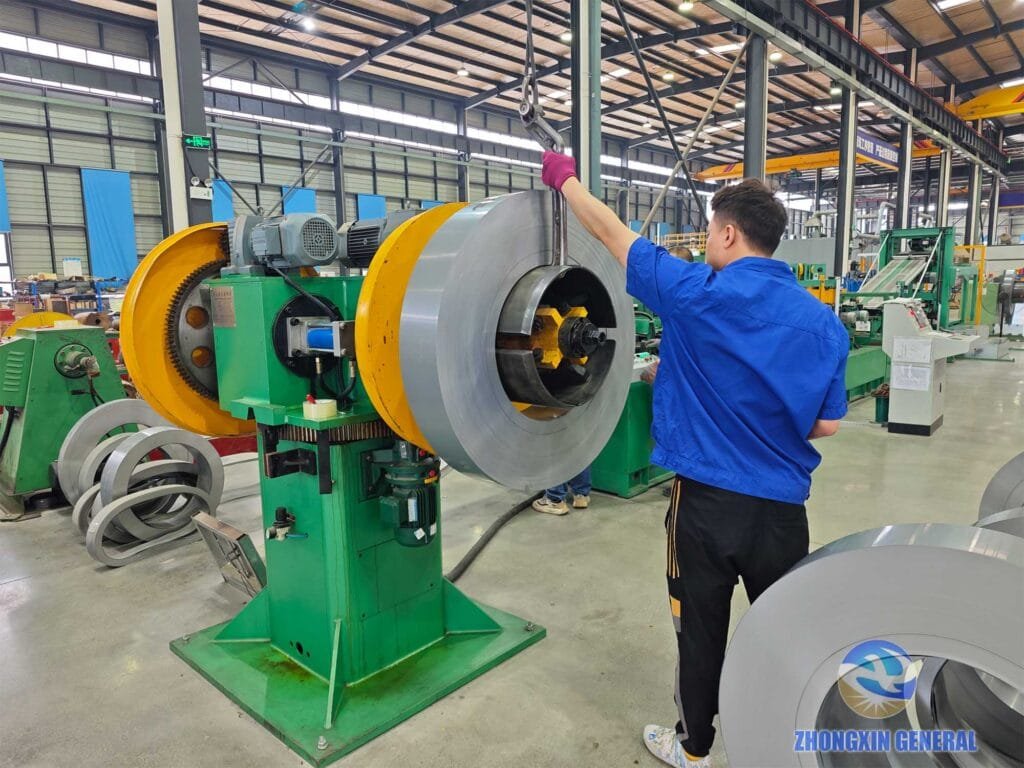 Overhead crane hoisting silicon steel coil for oil immersed transformer core production