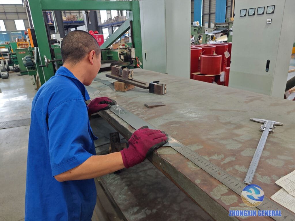 Quality inspector measuring silicon steel sheet dimensions with precision tool