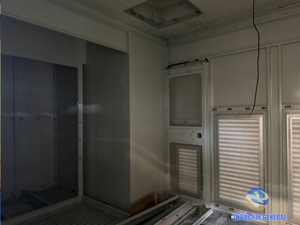 prefabricated energy storage cabin interior with ventilation louvers and equipment mounting positions