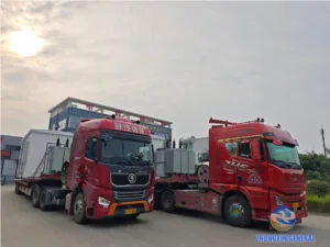 ZHONGXIN GENERAL two heavy-duty trucks loaded with 35kV prefabricated cabin substations and oil-immersed transformers, ready for shipment to Tarim Oilfield Xinjiang