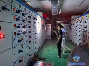 Basement power distribution room site acceptance inspection with installed switchgear cabinets for commercial & residential project