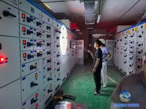 Basement power distribution room site acceptance inspection with installed switchgear cabinets for commercial & residential project