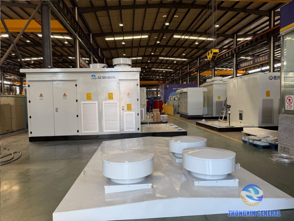 Prefabricated cabins with rooftop ventilation units ready to receive the 5250 kVA dry-type transformers and medium-voltage switchgear