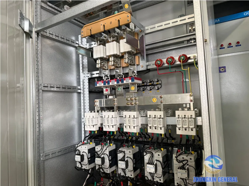 Reactive power compensation capacitor bank with contactors and fuses inside prefabricated substation