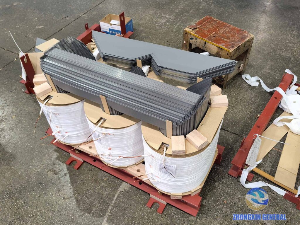 Hoist winding into core and reassemble top core for 250 kVA oil‑immersed transformer S11‑M‑250/10