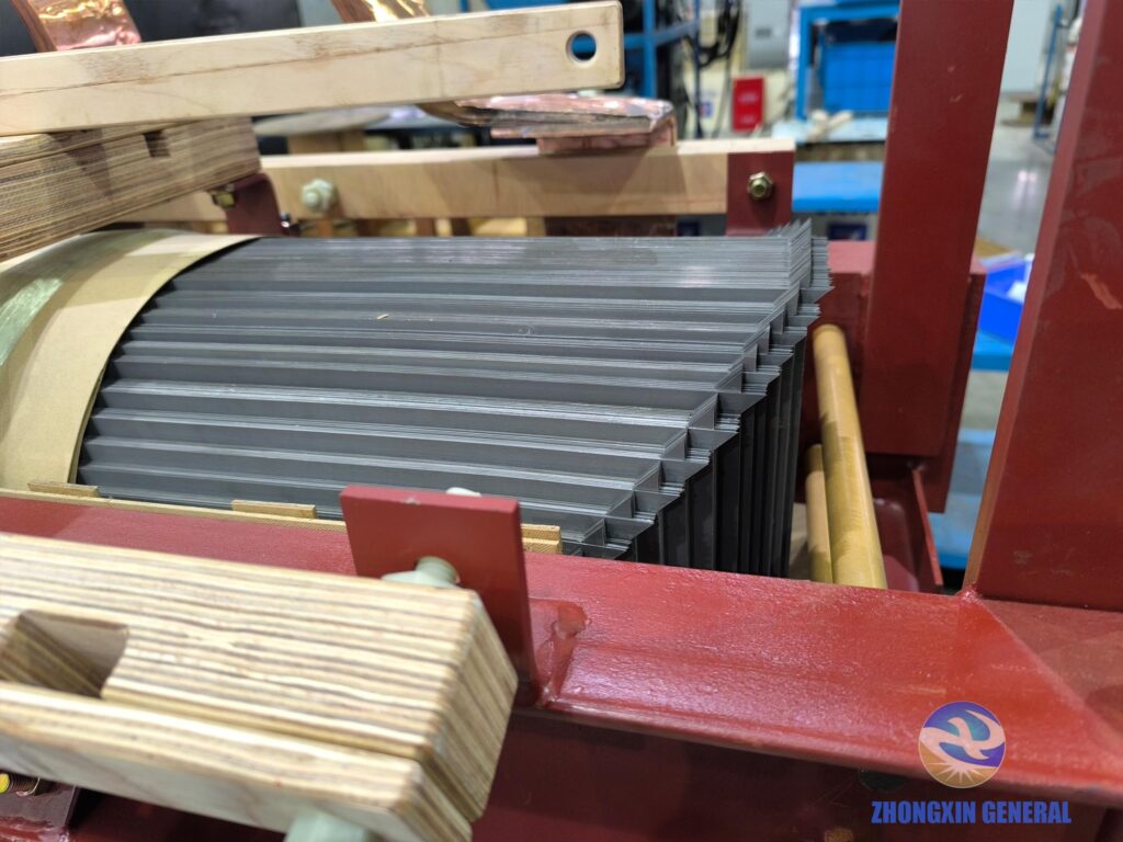 Close-up of silicon steel core lamination stacking on 4000 kVA oil-immersed transformer