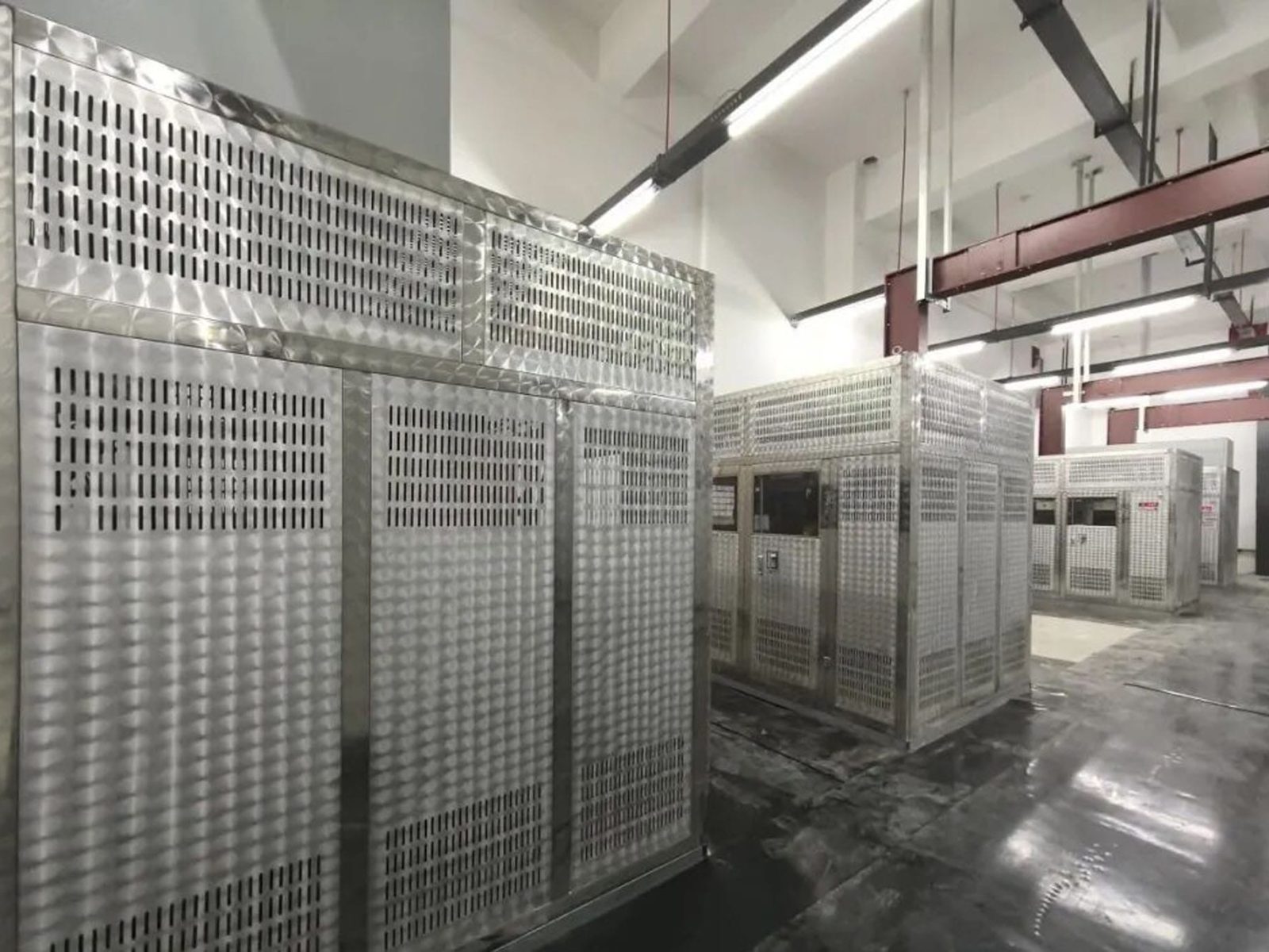 Multiple stainless steel enclosure dry-type transformers in Xinjin Hospital power distribution room by Zhongxin General